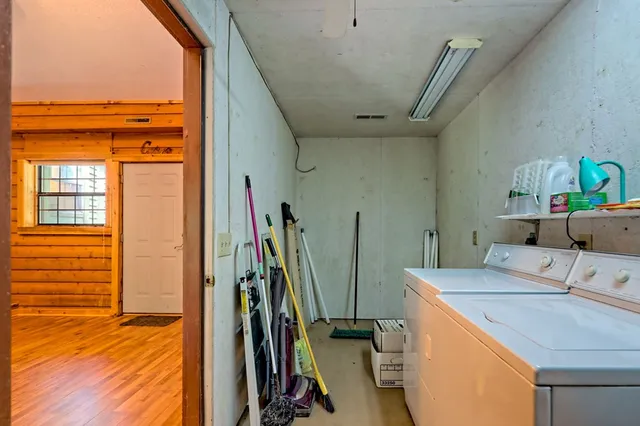 a view of a balcony with chairs