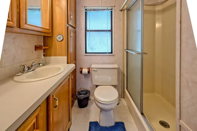 a dining room with furniture window and outside view