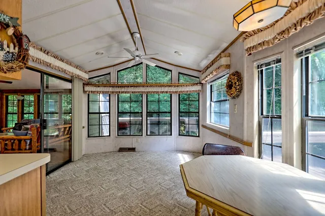 a kitchen with stainless steel appliances granite countertop a sink and cabinets