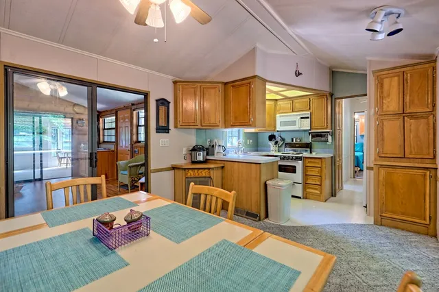 a backyard of a house with lots of green space