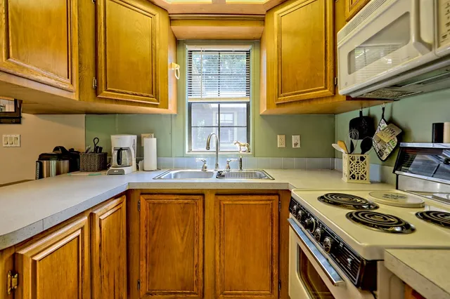 a backyard of a house with seating space