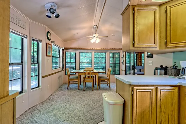 a backyard of a house with seating space