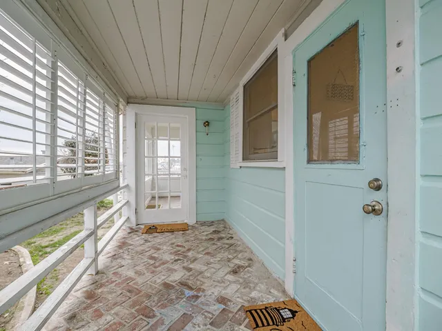 a view of a balcony with plants