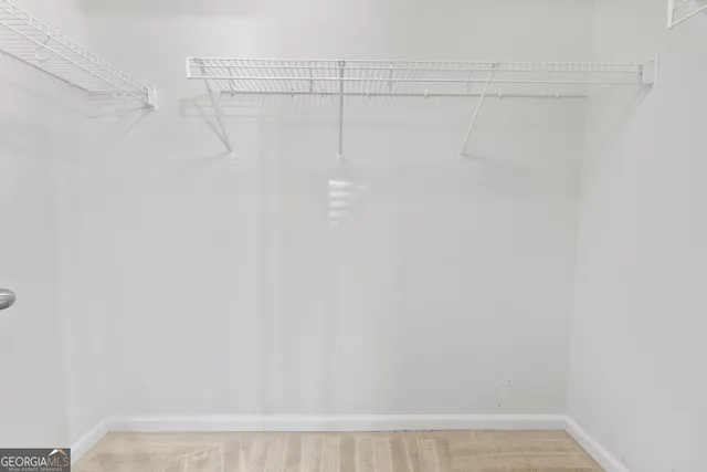 a view of small space with racks on the wall