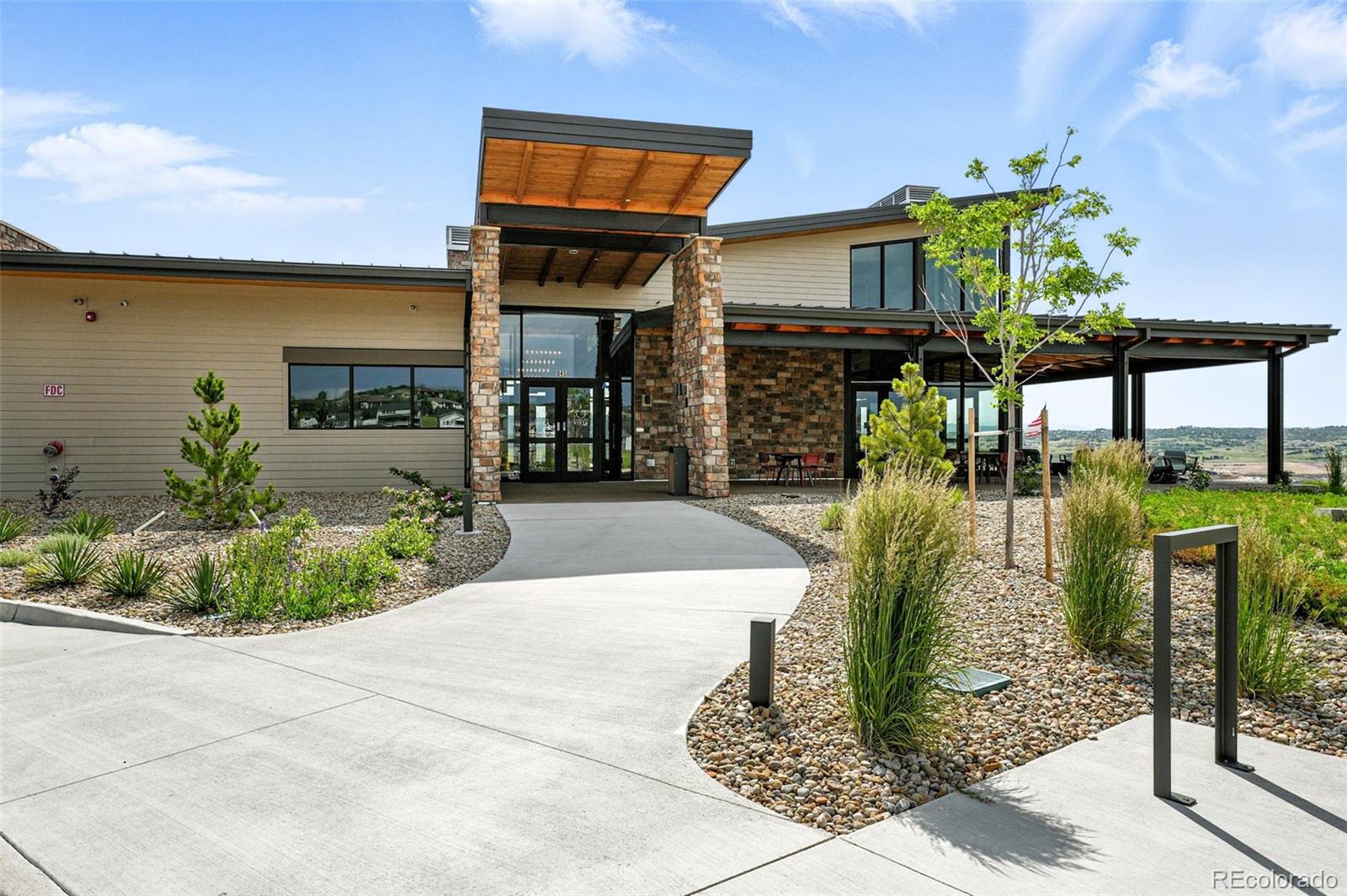 4855 Saddle Iron Road Castle Rock, CO 80104 - Photo 47 of 50 a front view of a house