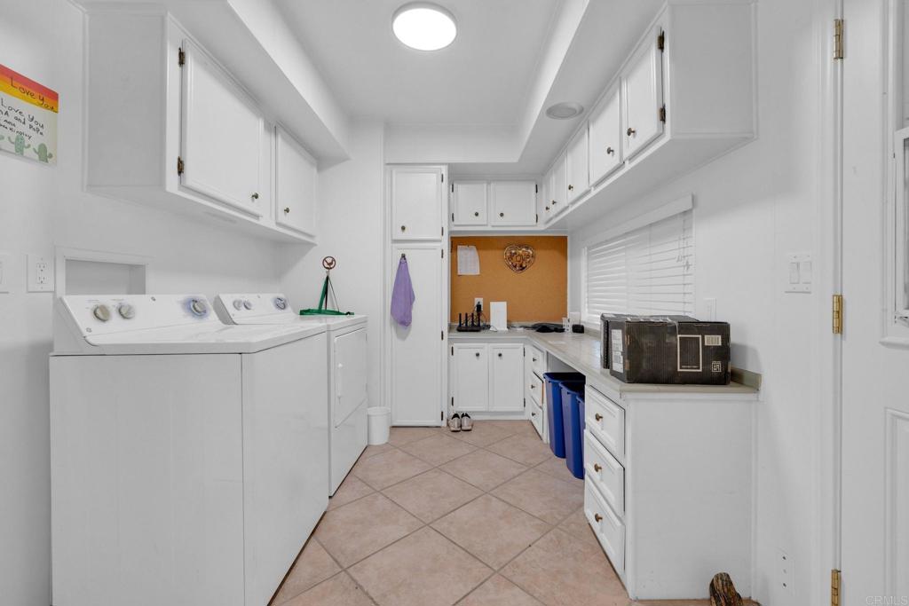 1010 Palm Canyon Drive, Unit 249 Borrego Springs, CA 92004 - Photo 18 of 23 a utility room with stainless steel appliances washer and dryer