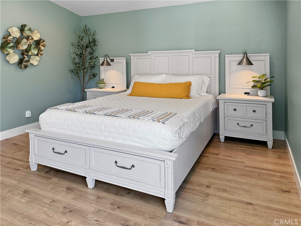 16955 Lake Knoll Parkway Riverside, CA 92503 - Photo 26 of 42 a bedroom with a bed and a closet
