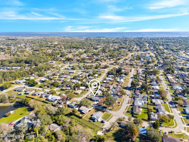 an aerial view of multiple house