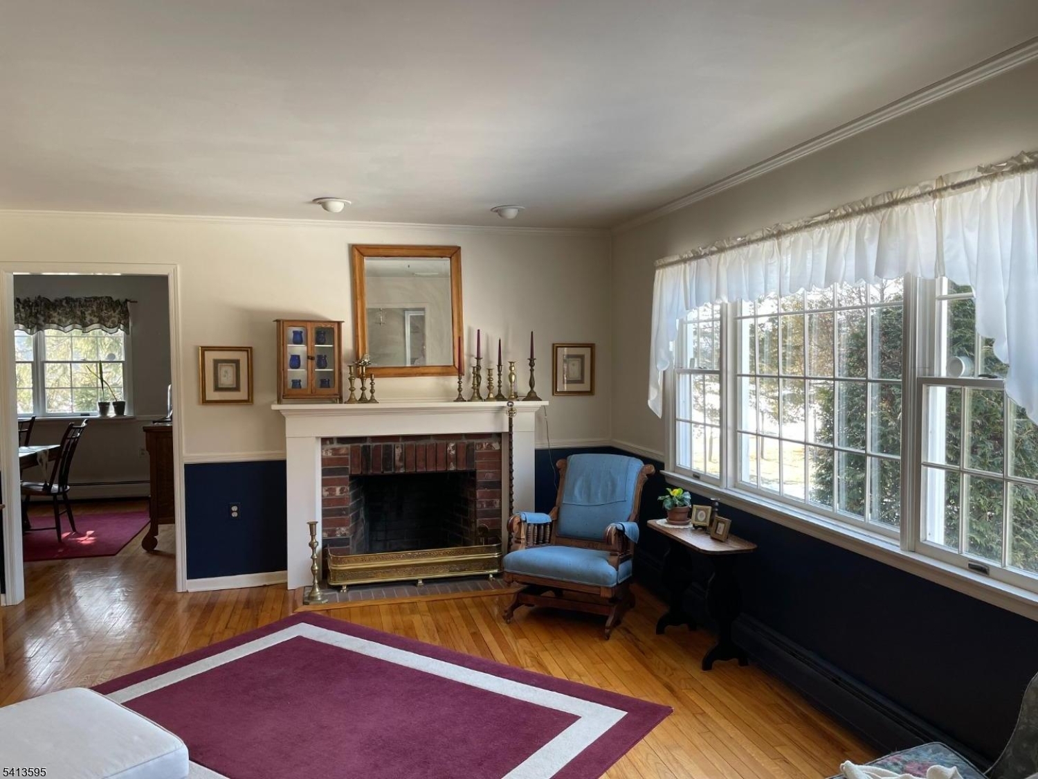 938 Potters Road Newton, NJ 07860 - Photo 7 of 26 a living room with furniture rug and window