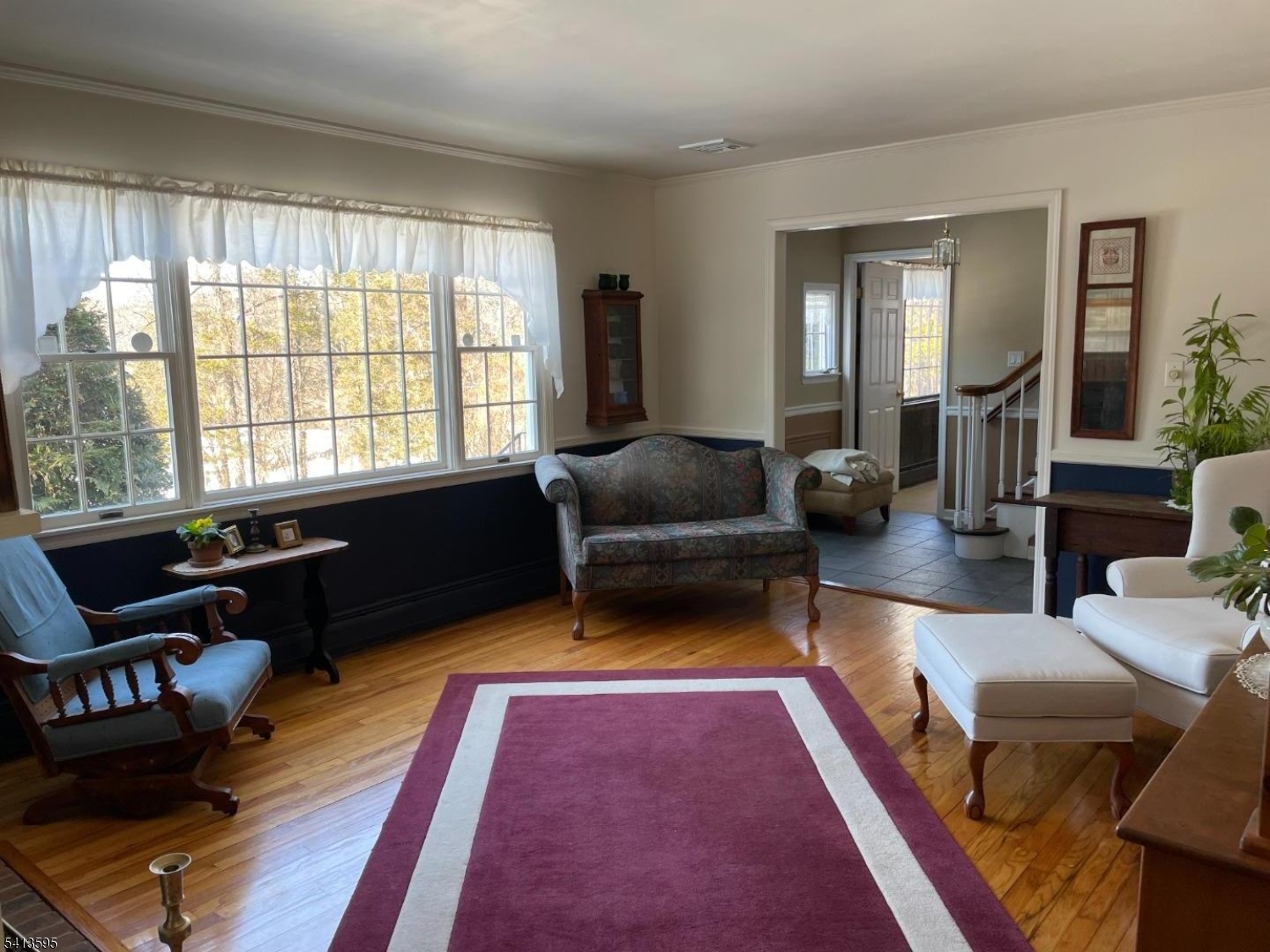 938 Potters Road Newton, NJ 07860 - Photo 8 of 26 a living room with furniture rug and window