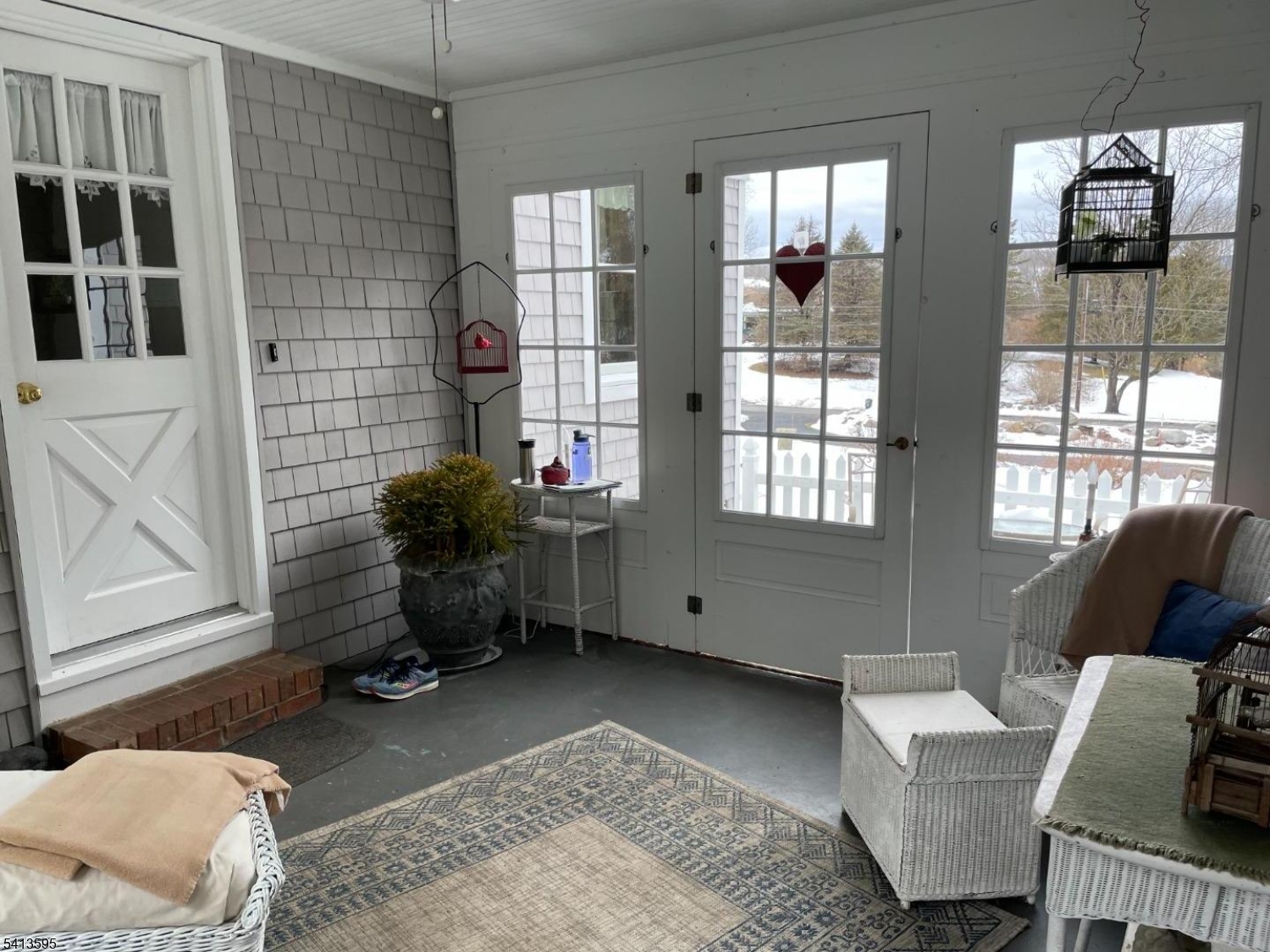 938 Potters Road Newton, NJ 07860 - Photo 10 of 26 a living room with furniture and two window