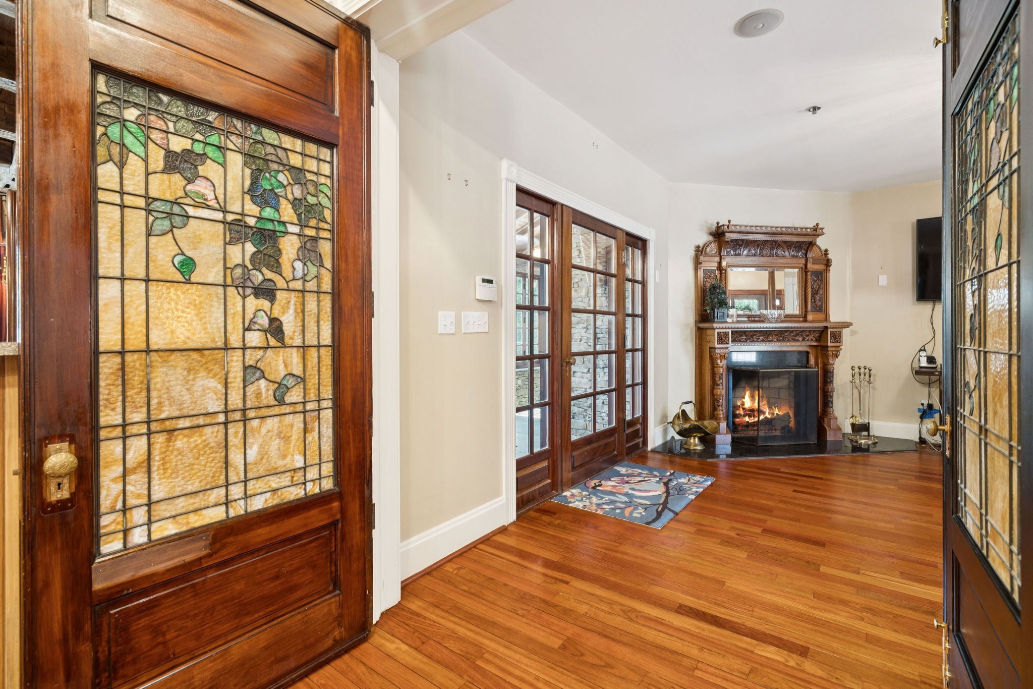1374 Peter Pond Road Ashland City, TN 37015 - Photo 12 of 94 a view of a livingroom with wooden floor and a fireplace