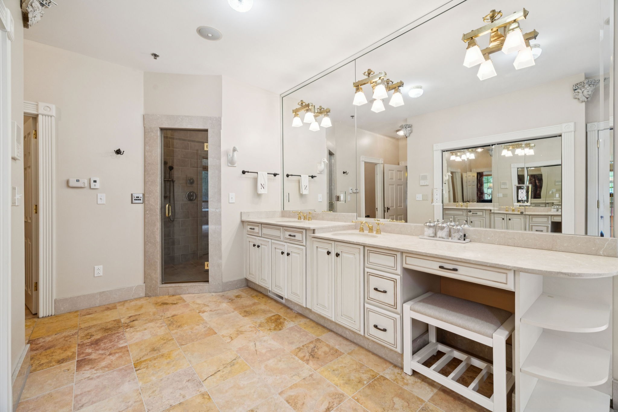 1374 Peter Pond Road Ashland City, TN 37015 - Photo 21 of 94 a spacious bathroom with a granite countertop sink a large mirror and a shower