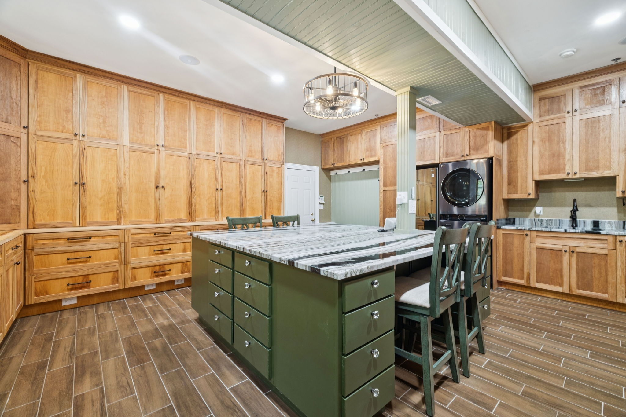 1374 Peter Pond Road Ashland City, TN 37015 - Photo 24 of 94 a kitchen with a table chairs sink and cabinets