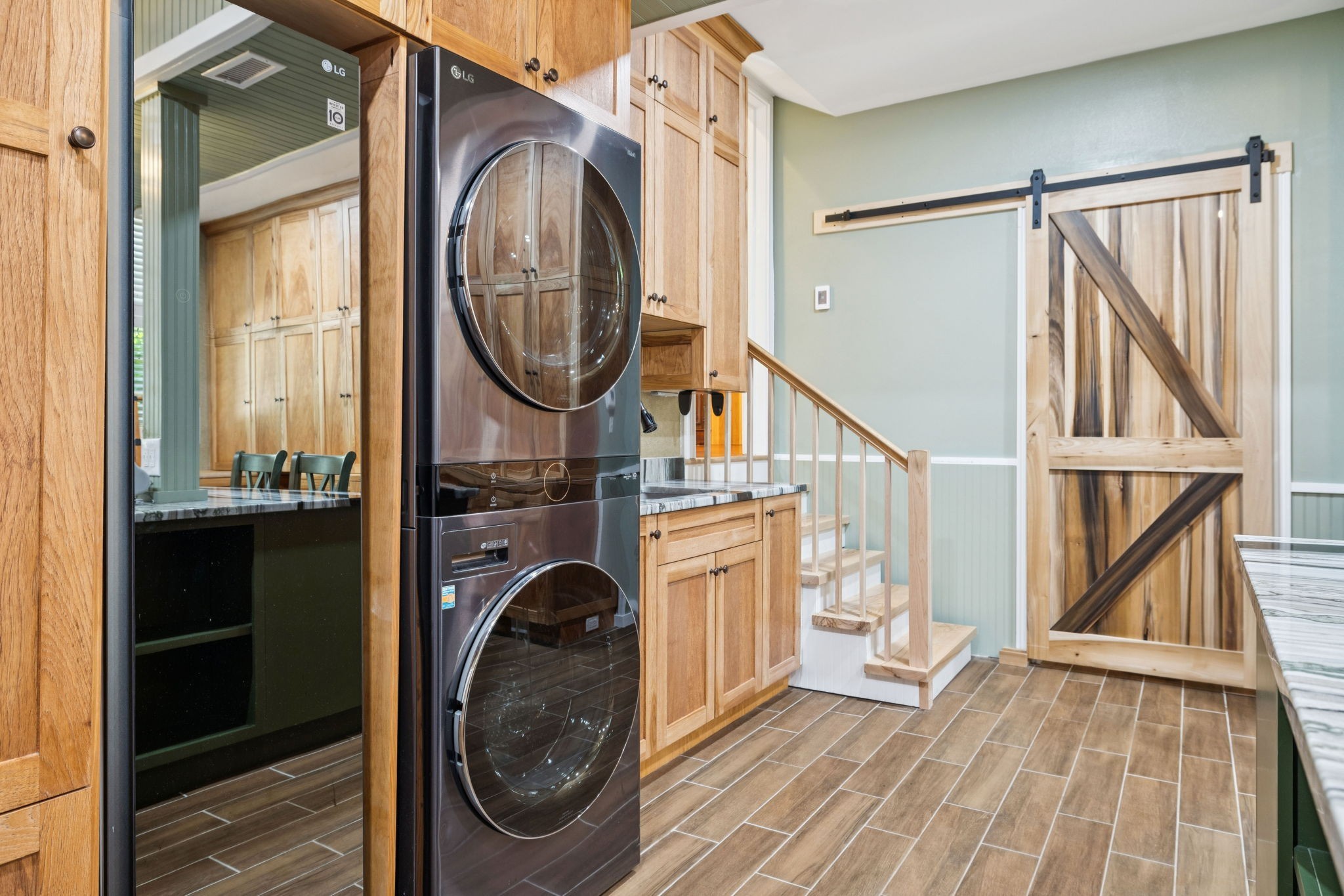 1374 Peter Pond Road Ashland City, TN 37015 - Photo 26 of 94 a view of a hallway with washer and dryer