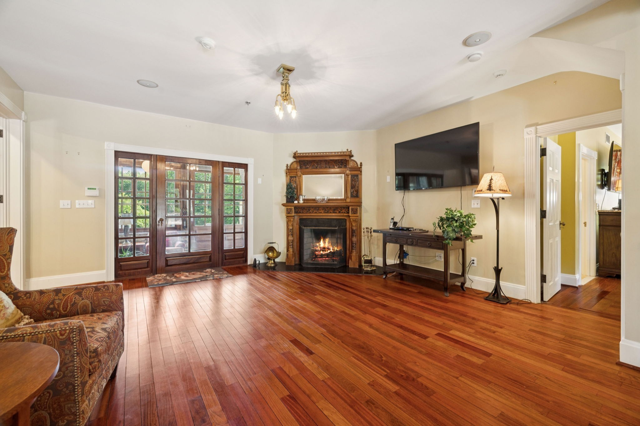 1374 Peter Pond Road Ashland City, TN 37015 - Photo 5 of 94 a view of a livingroom with wooden floor and a fireplace