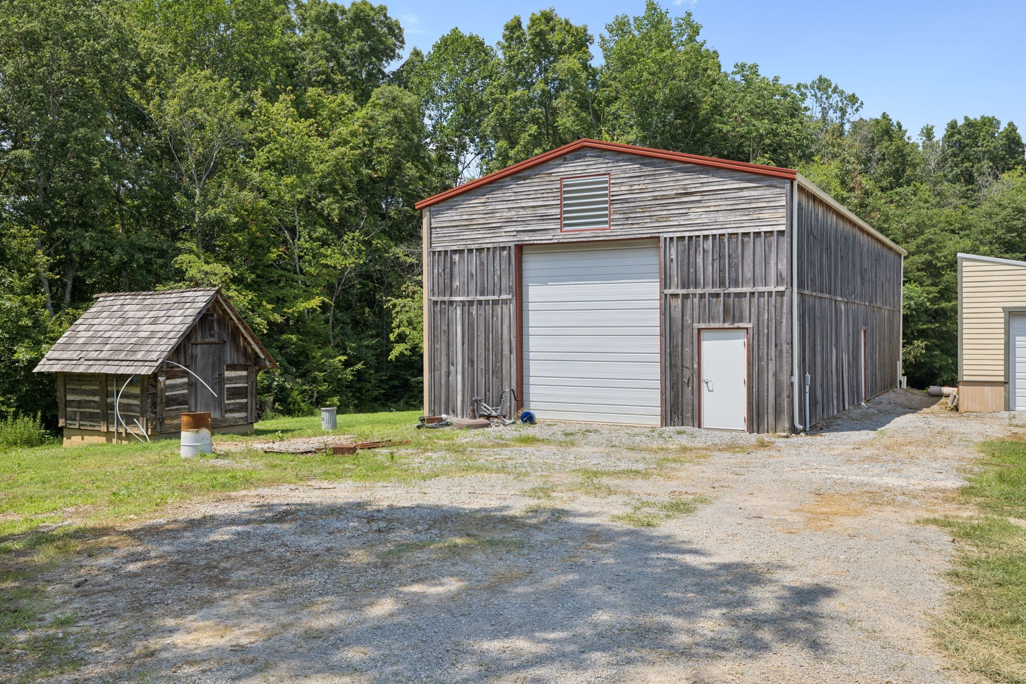 1374 Peter Pond Road Ashland City, TN 37015 - Photo 80 of 94 a front view of a house with a yard and garage