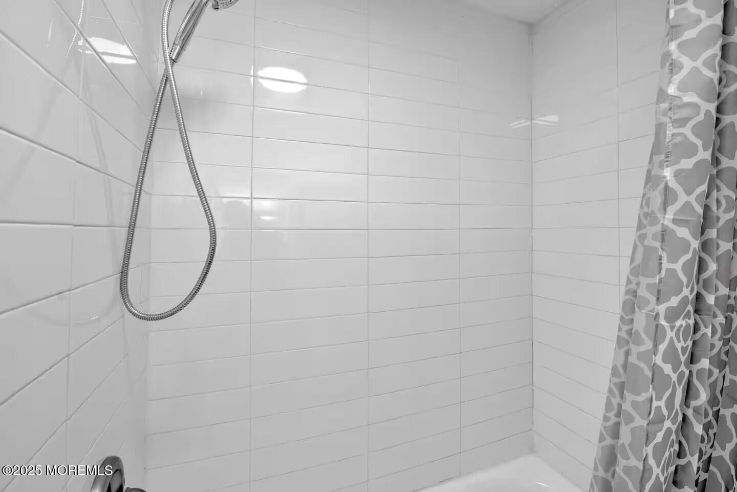 1204 Emory Street, Unit 2 Asbury Park, NJ 07712 - Photo 16 of 33 a bathroom with a shower