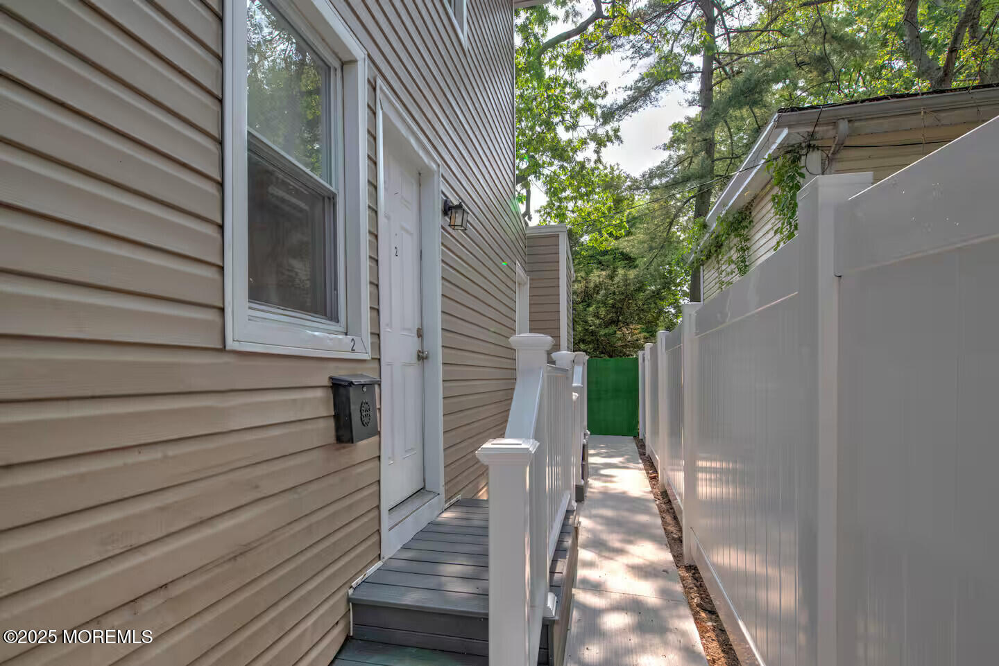 1204 Emory Street, Unit 2 Asbury Park, NJ 07712 - Photo 3 of 33 a view of a house with a yard