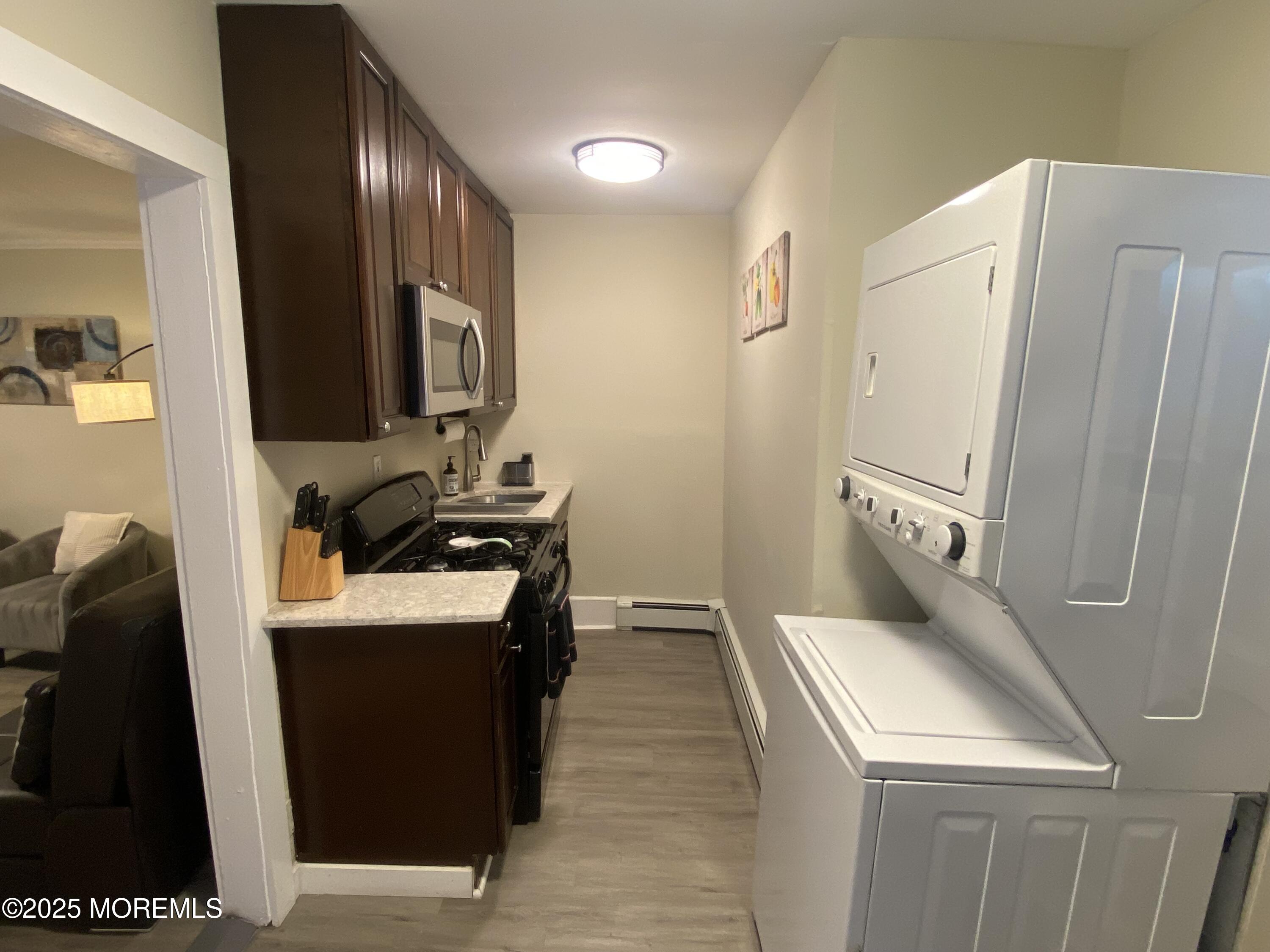 1204 Emory Street, Unit 2 Asbury Park, NJ 07712 - Photo 9 of 33 a room with storage and utility