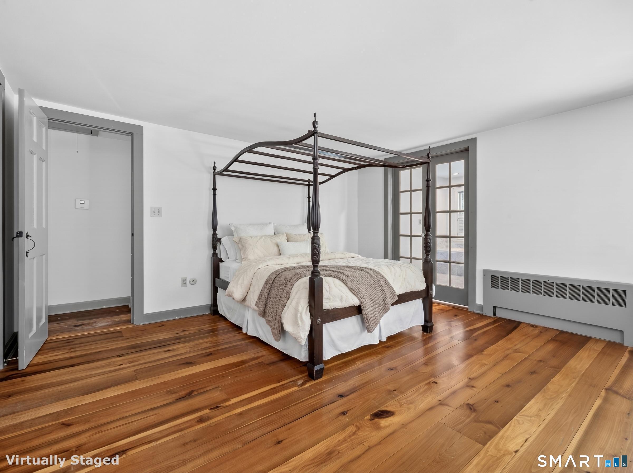 14 Cow Pen Hill Road Killingworth, CT 06419 - Photo 33 of 40 The spacious primary suite offers the privacy of an ensuite bath while remaining conveniently located near the other bedrooms