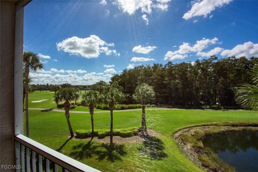 10461 Washingtonia Palm Way, Unit 3435 Fort Myers, FL 33966 - Photo 2 of 36 a view of a golf course with a swimming pool