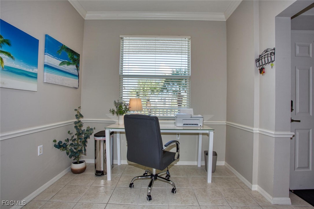 10461 Washingtonia Palm Way, Unit 3435 Fort Myers, FL 33966 - Photo 7 of 36 a view of a workspace with furniture and a window