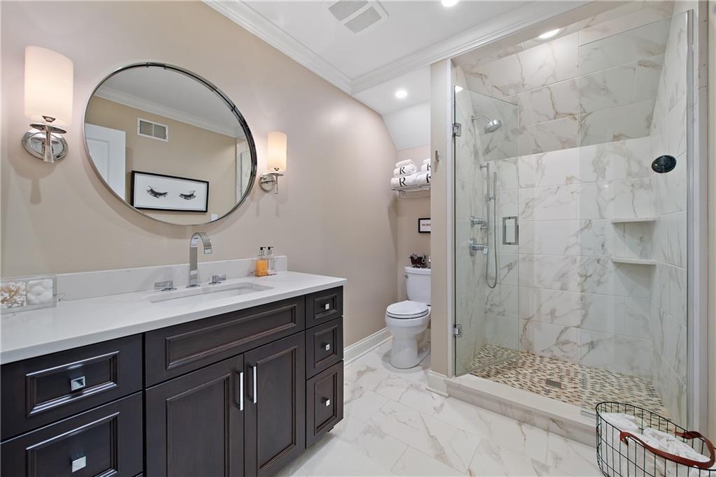 1706 Hastings Mill Road Pittsburgh, PA 15241 - Photo 18 of 25 a spacious bathroom with a granite countertop sink mirror and shower