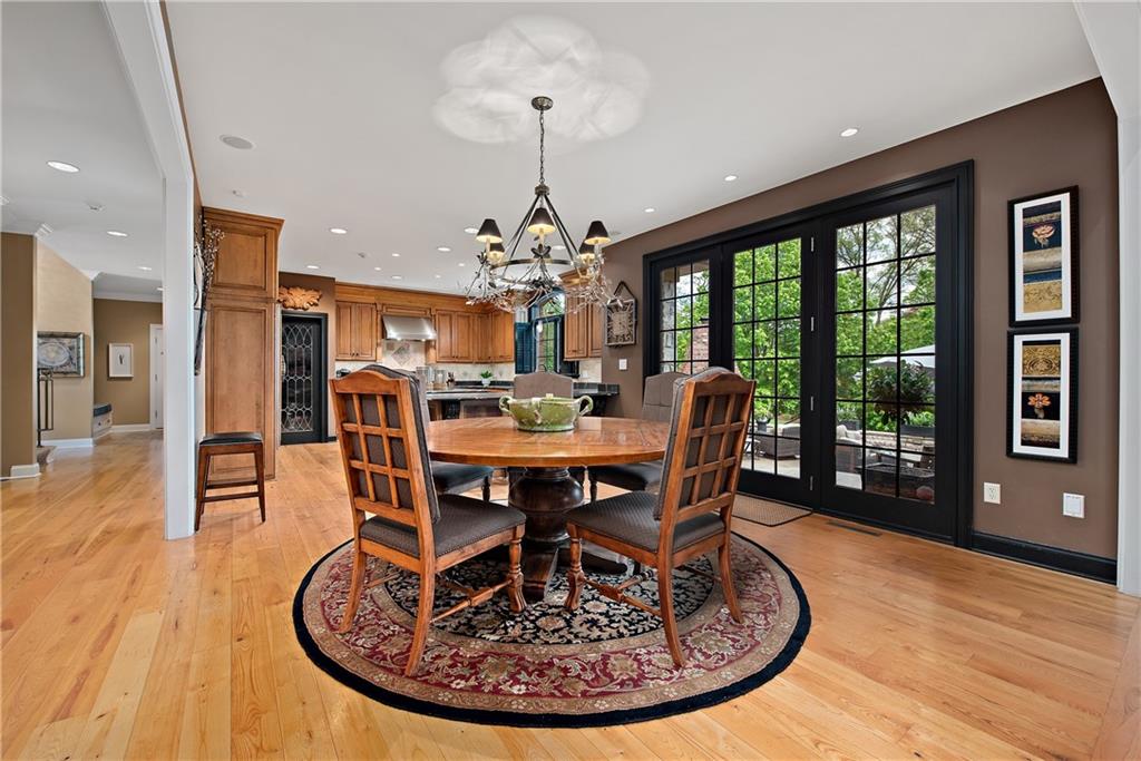 1706 Hastings Mill Road Pittsburgh, PA 15241 - Photo 10 of 25 a view of a dining room with furniture window and wooden floor