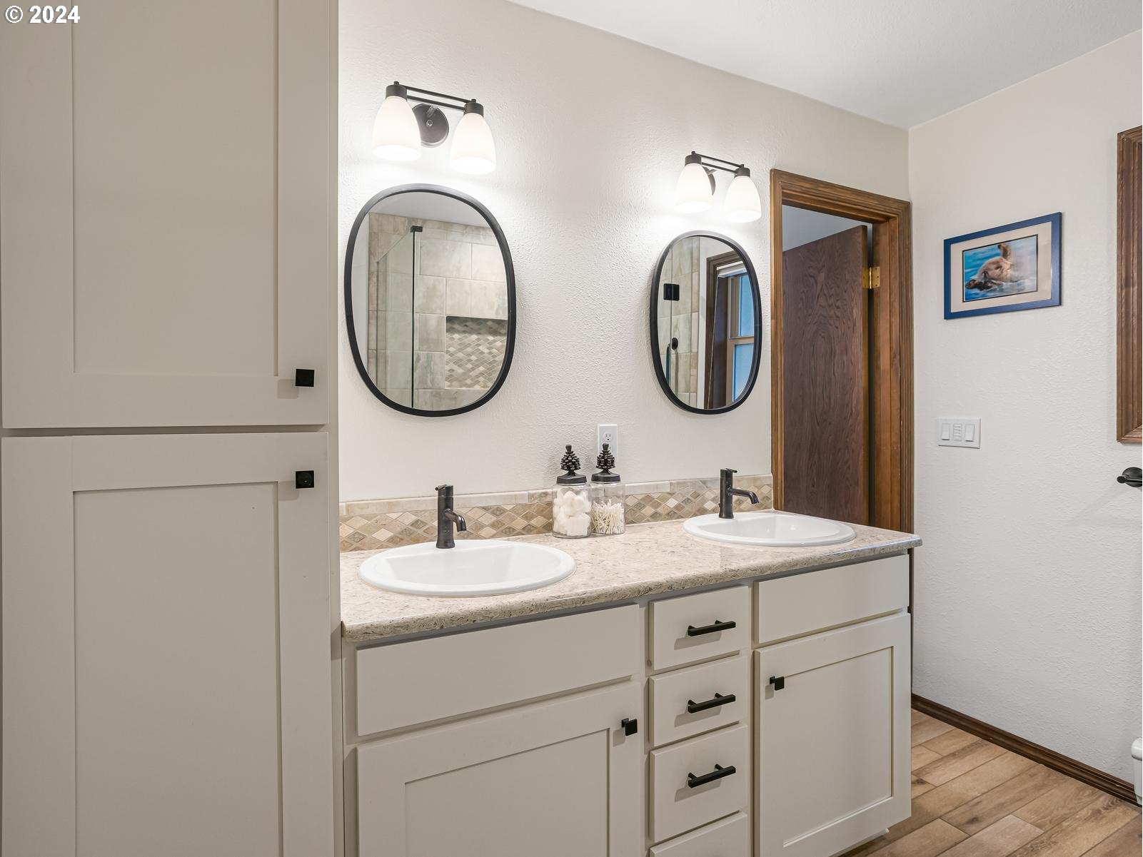 18550 Southeast Jacoby Road Sandy, OR 97055 - Photo 22 of 47 a bathroom with a sink and a mirror