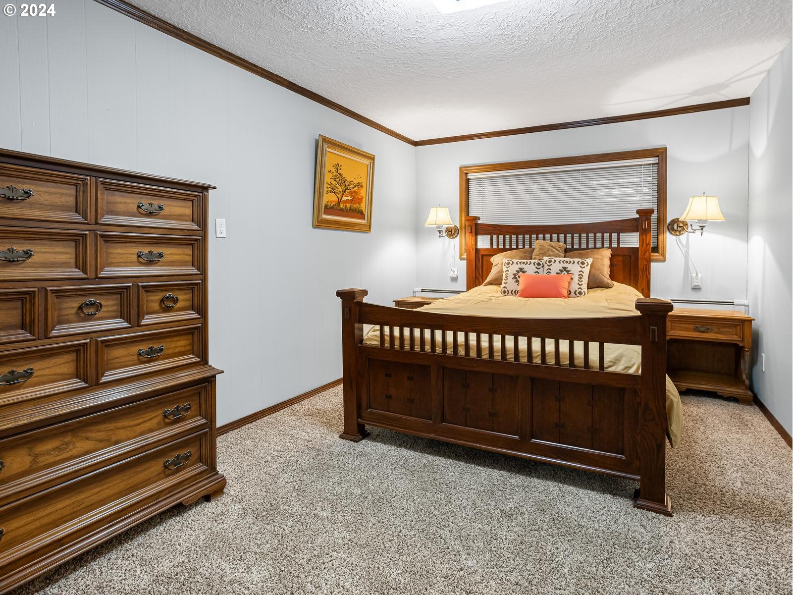 18550 Southeast Jacoby Road Sandy, OR 97055 - Photo 34 of 47 a bedroom with a bed and a dresser