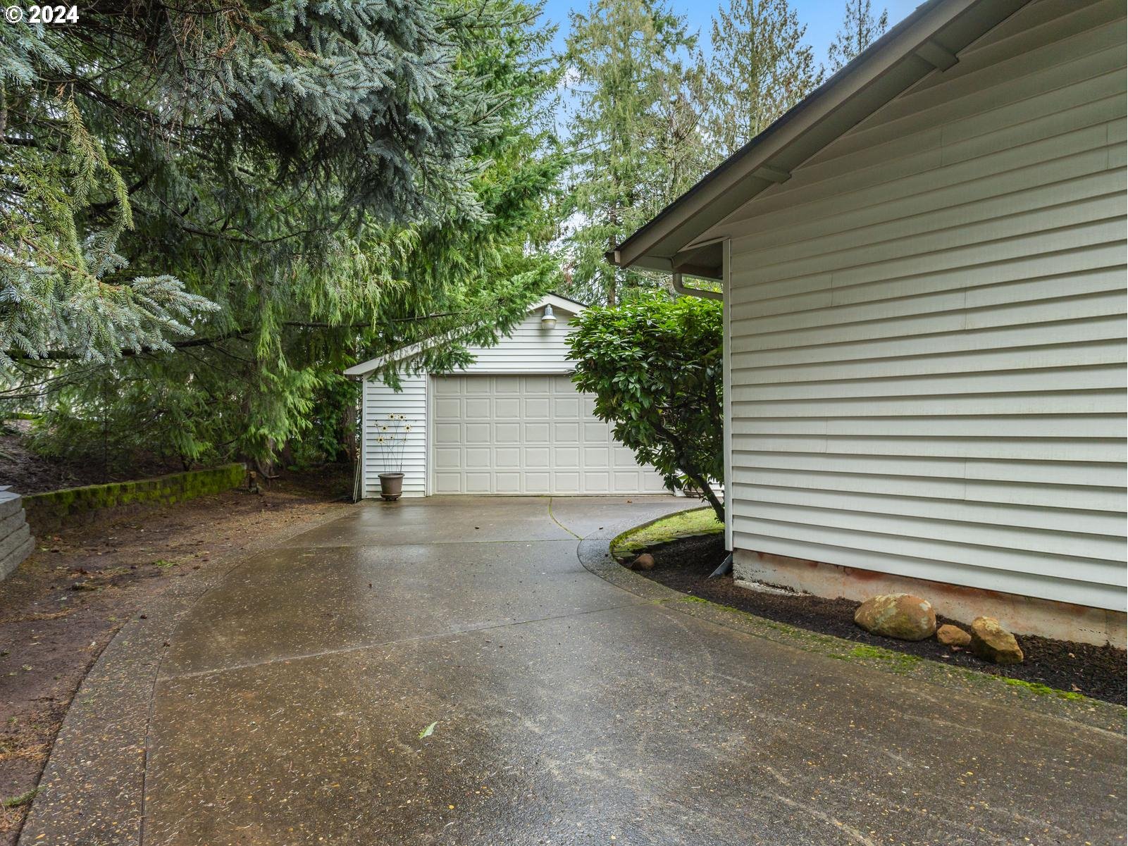 18550 Southeast Jacoby Road Sandy, OR 97055 - Photo 36 of 47 a view of backyard and tree