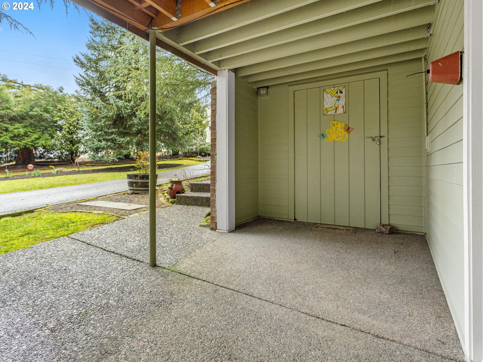 18550 Southeast Jacoby Road Sandy, OR 97055 - Photo 43 of 47 an empty room with floor to ceiling windows and pool table and chairs