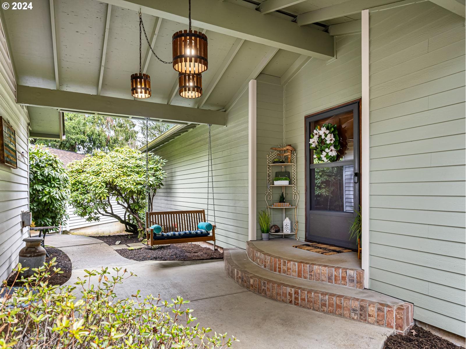 18550 Southeast Jacoby Road Sandy, OR 97055 - Photo 5 of 47 a view of the house with a porch