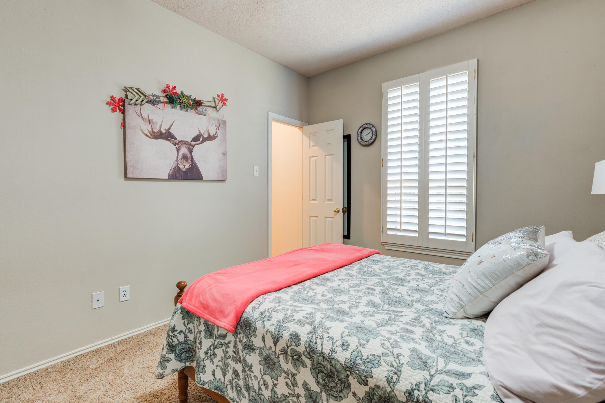 6310 8th Street Lubbock, TX 79416 - Photo 39 of 45 a bedroom with a bed and a window