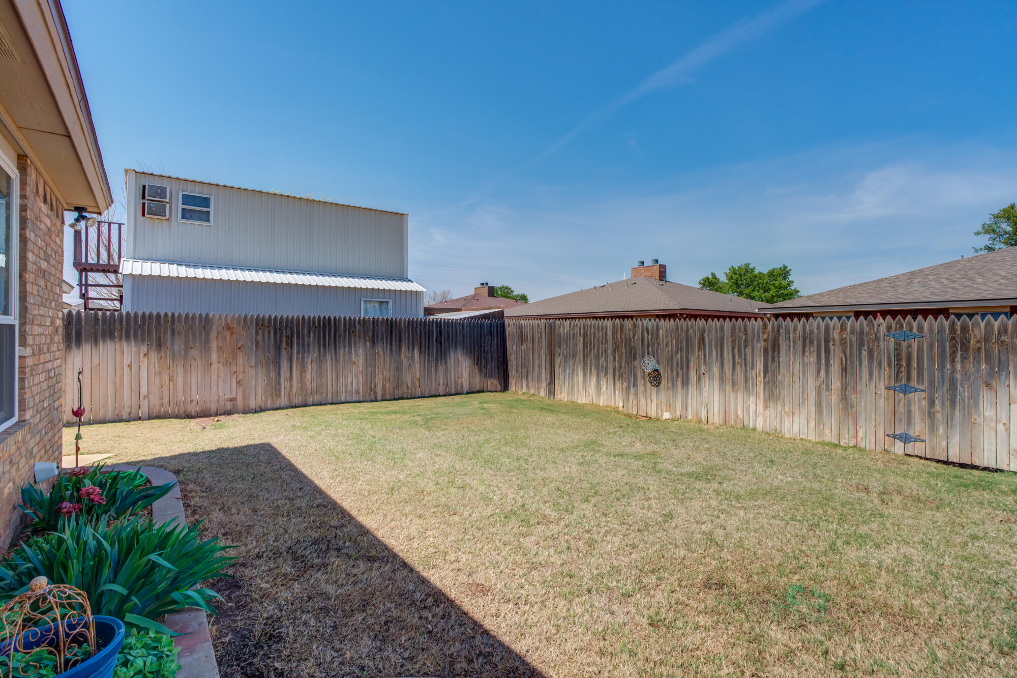 6310 8th Street Lubbock, TX 79416 - Photo 44 of 45 Sprinklers keep it green and healthy