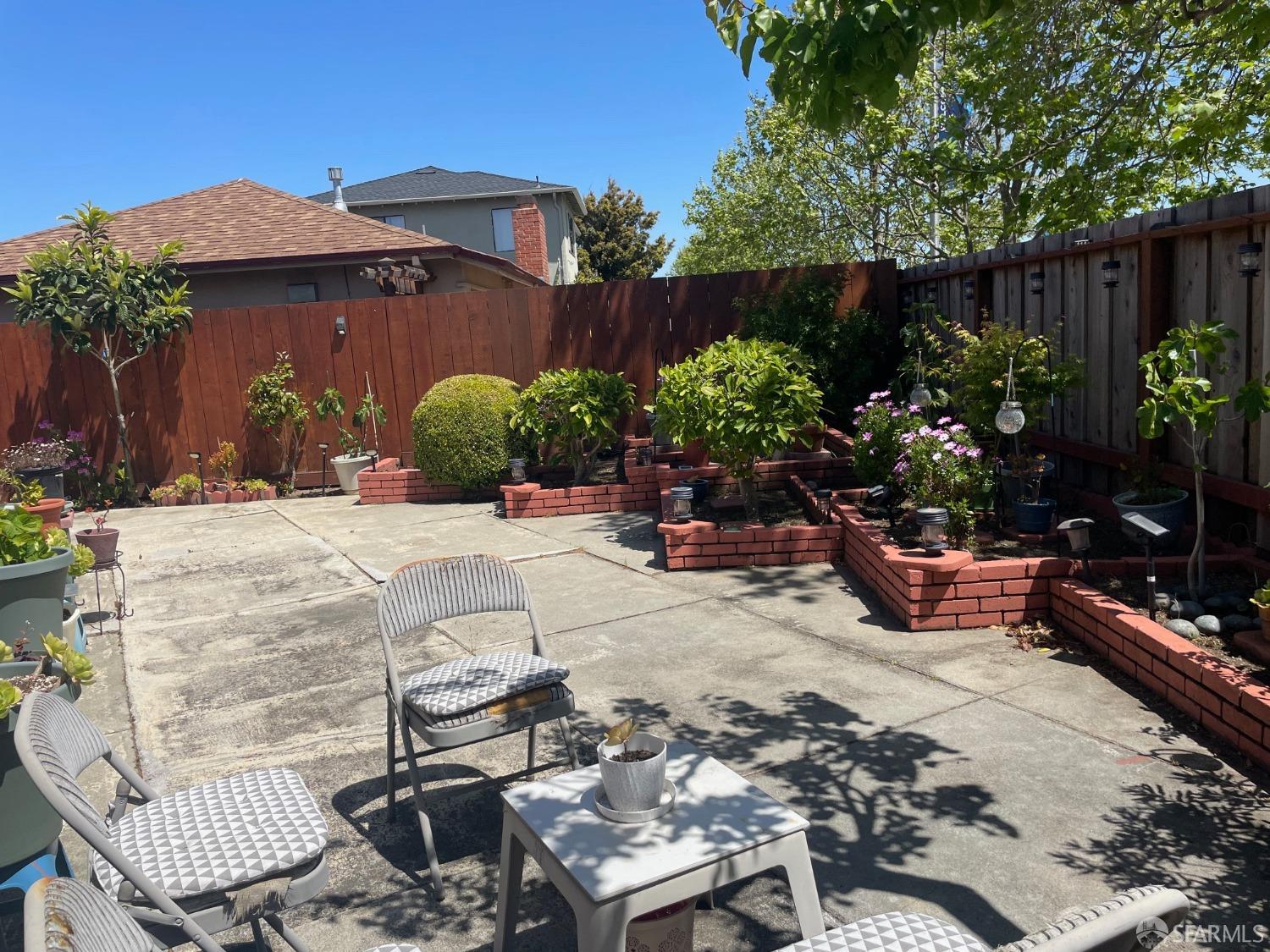 168 Park Boulevard Millbrae, CA 94030 - Photo 11 of 19 a view of a backyard with sitting area