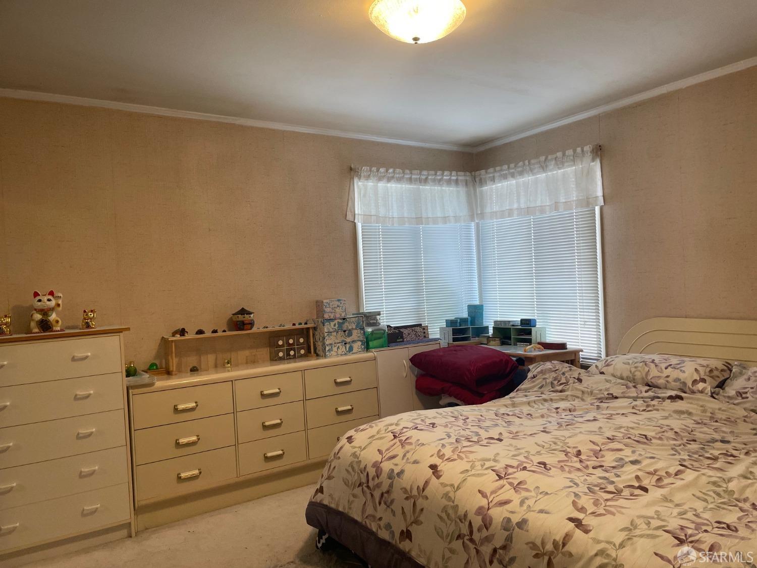 168 Park Boulevard Millbrae, CA 94030 - Photo 12 of 19 a bedroom with a bed and a dresser