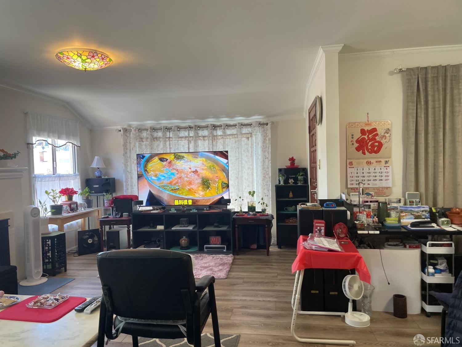 168 Park Boulevard Millbrae, CA 94030 - Photo 15 of 19 a living room with furniture and a flat screen tv