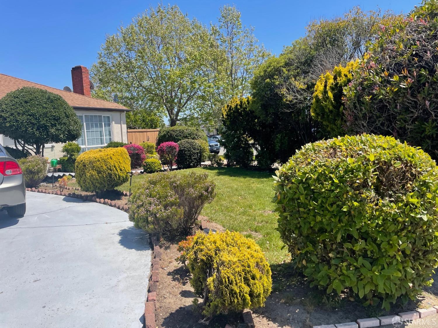 168 Park Boulevard Millbrae, CA 94030 - Photo 2 of 19 a view of backyard with outdoor seating and green space