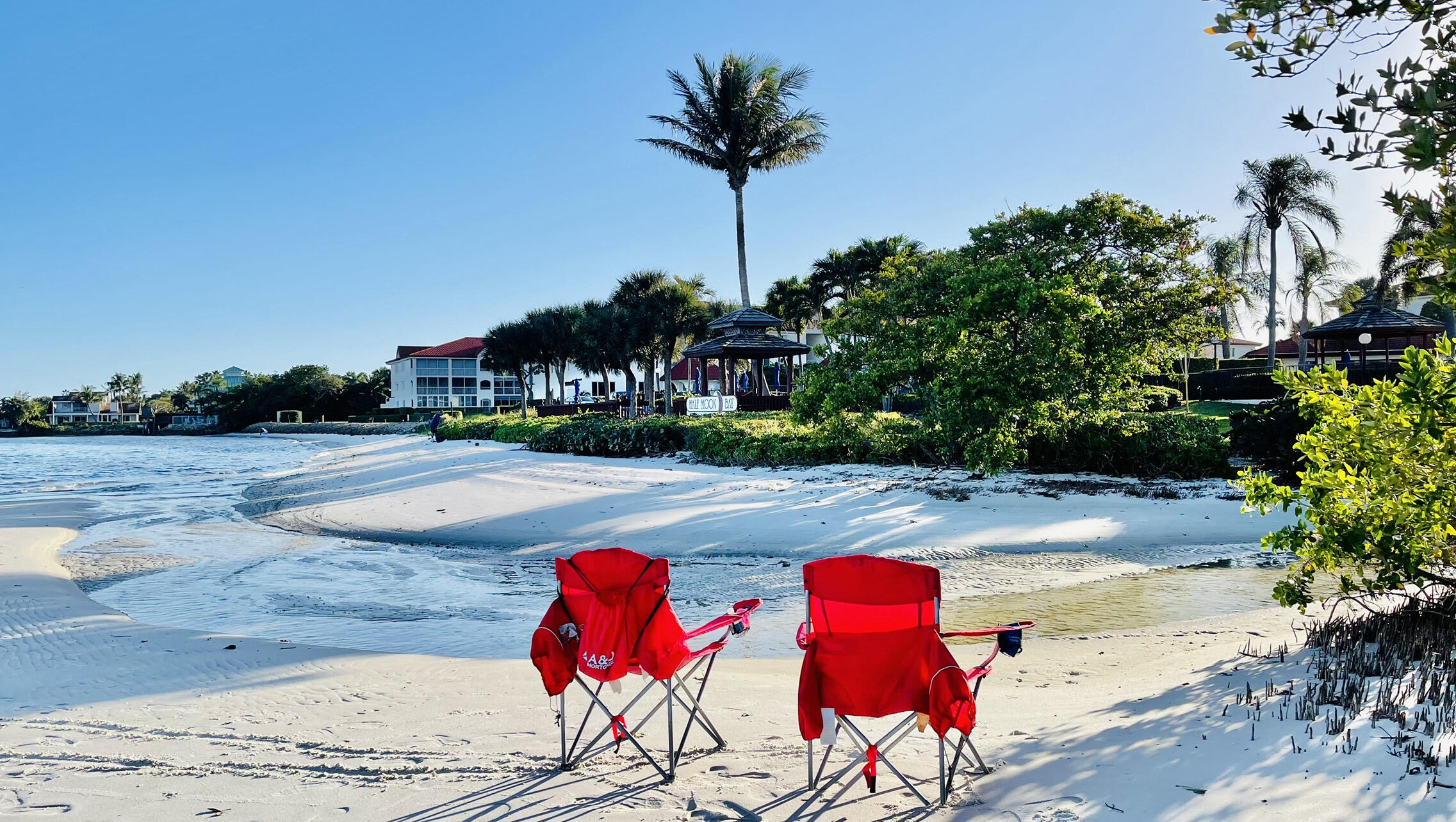 104 Half Moon Circle, Unit B2 Hypoluxo, FL 33462 - Photo 5 of 54 a view of street with an ocean view