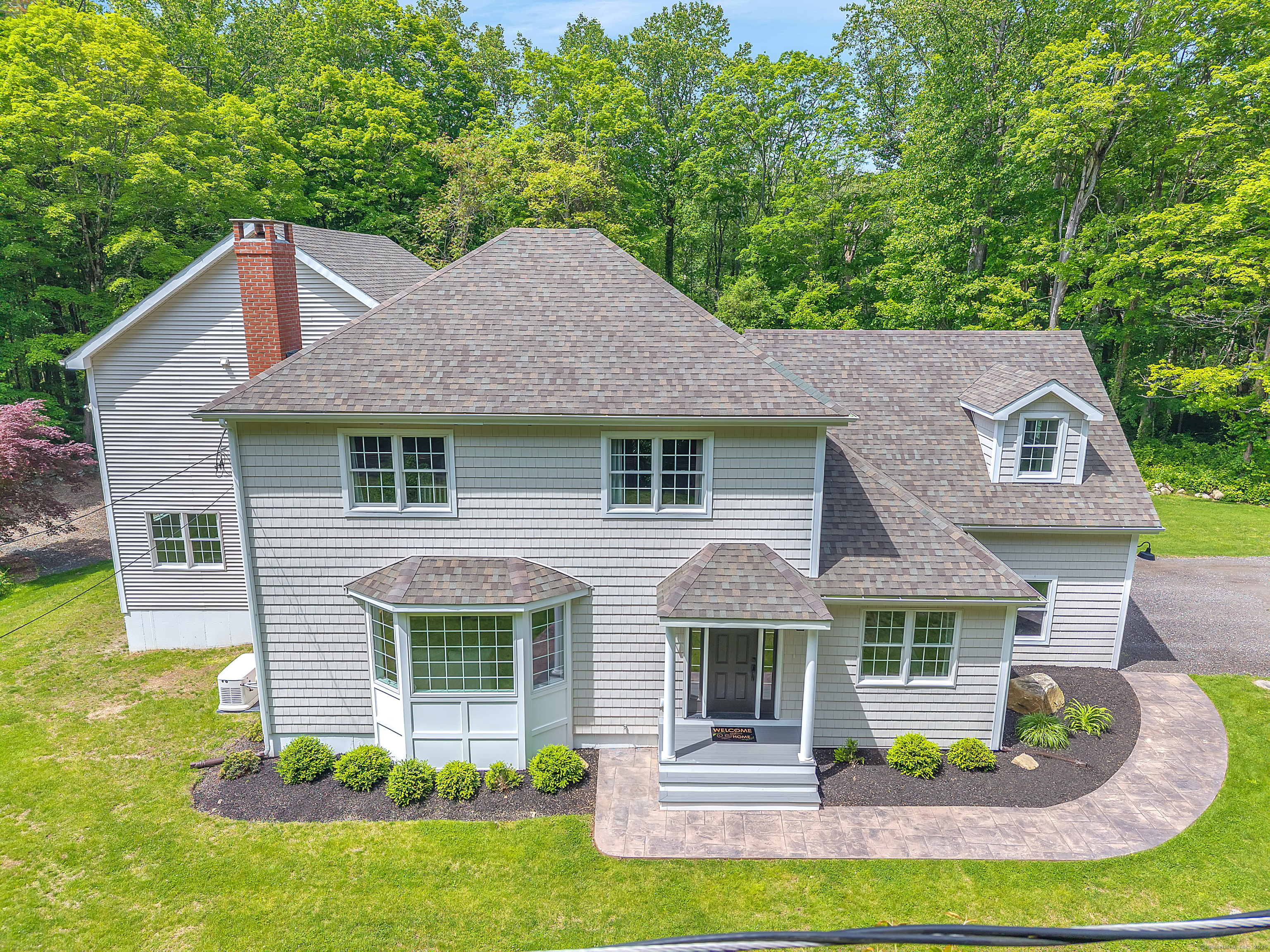 479 Opening Hill Road Madison, CT 06443 - Photo 1 of 1 a front view of a house with garden