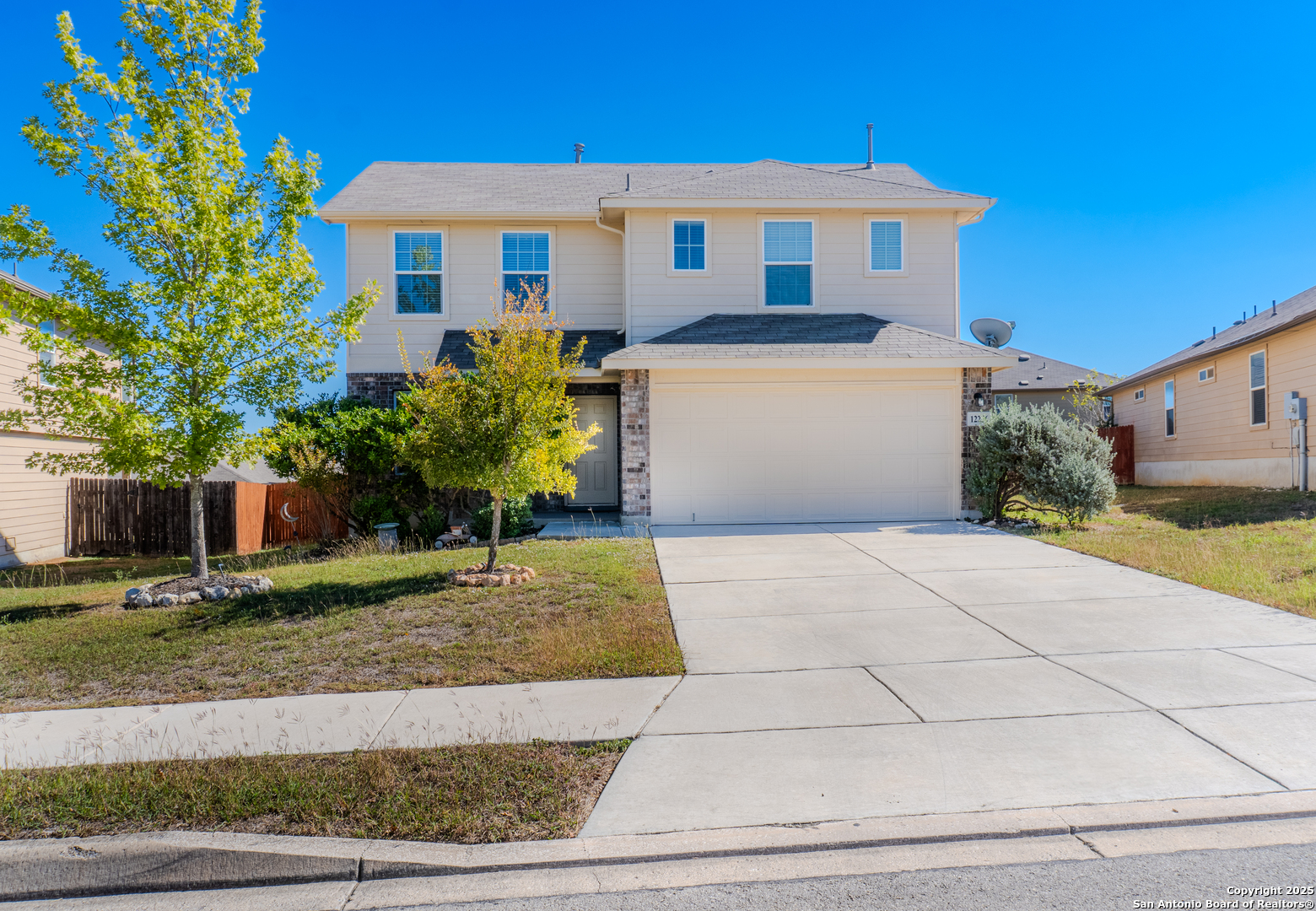 12236 Bening Schertz, TX 78154 - Photo 1 of 16 a front view of a house with garden