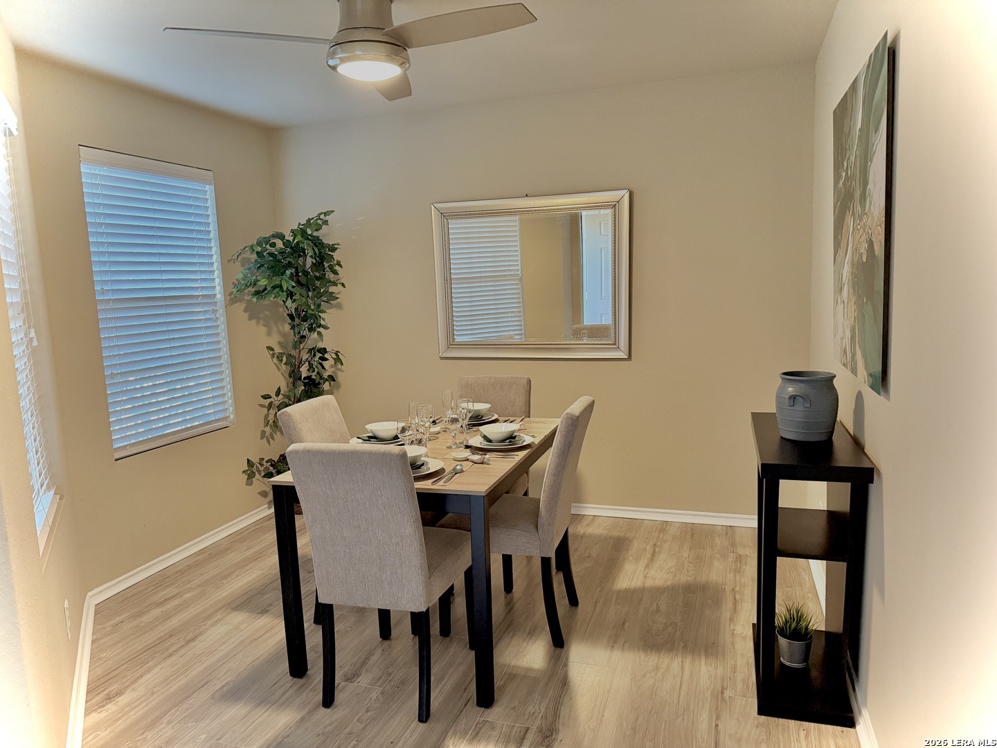 12236 Bening Schertz, TX 78154 - Photo 3 of 16 a view of a dining room with furniture and wooden floor