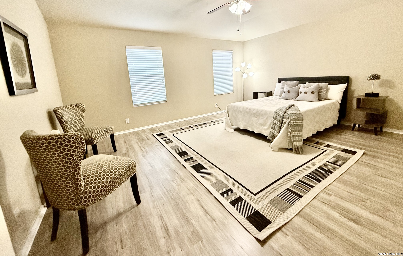 12236 Bening Schertz, TX 78154 - Photo 9 of 16 a living room with a bed furniture and a window