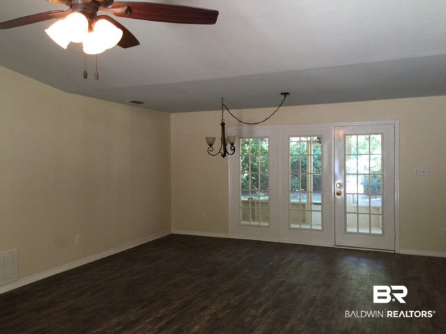 5249 Pine Road Orange Beach, AL 36561 - Photo 14 of 24 New Smooth Ceilings and New Paint ith Fnce Doors leading to balcony