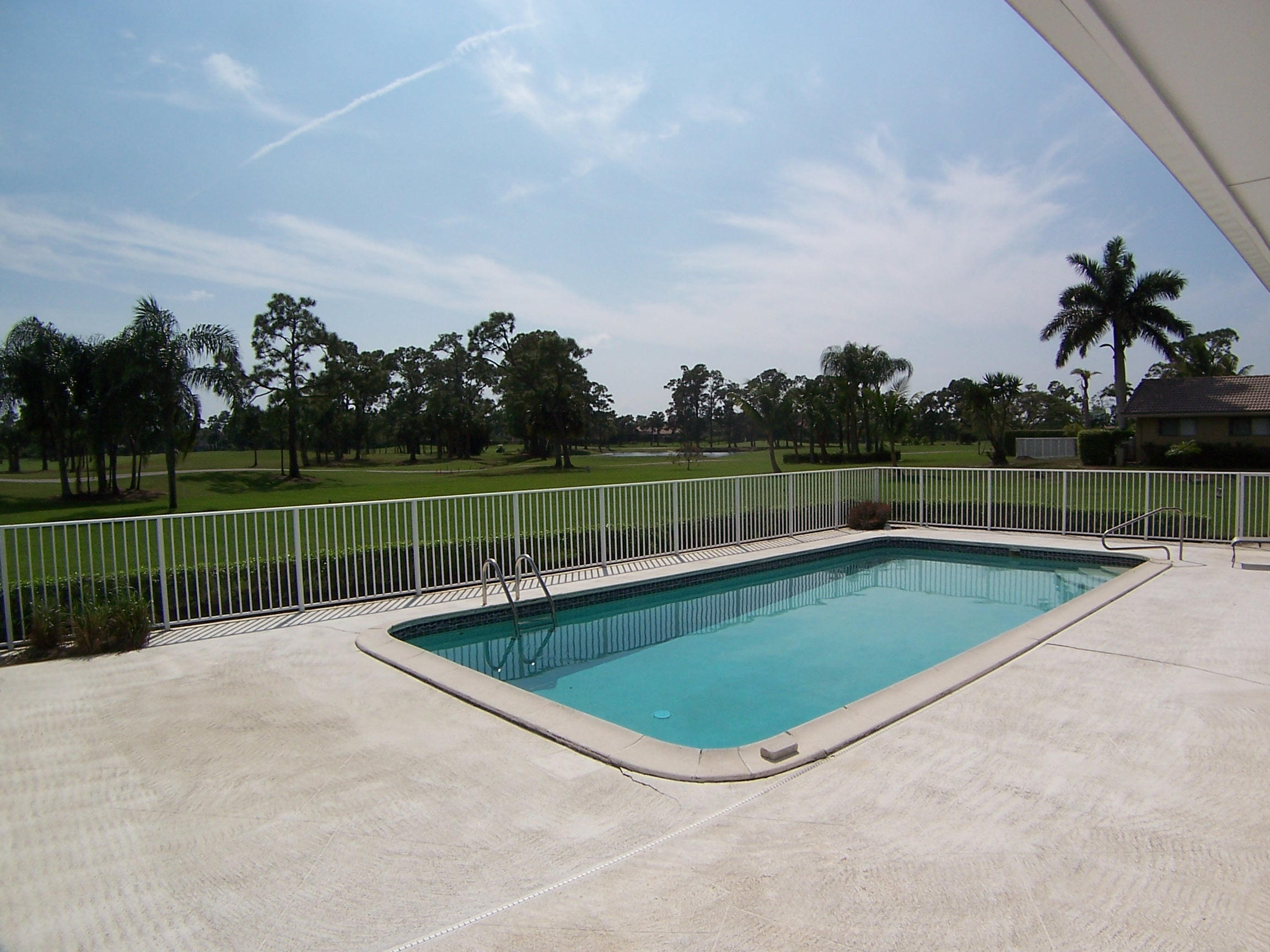 9114 Perth Road Lake Worth, FL 33467 - Photo 23 of 26 Pool and View of Golf Course