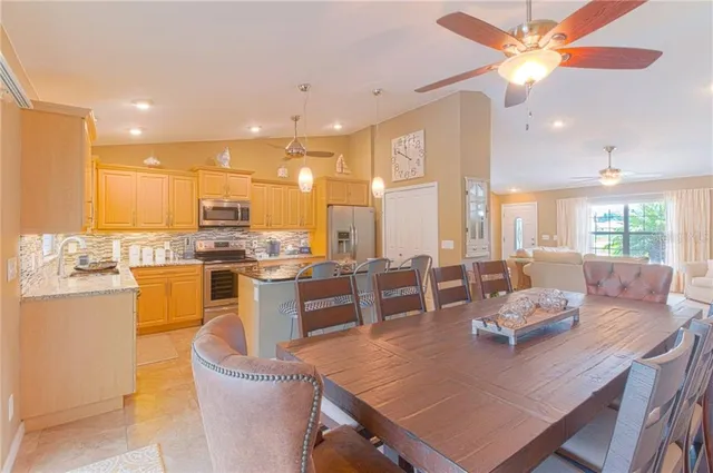 a view of a dining room kitchen and a window
