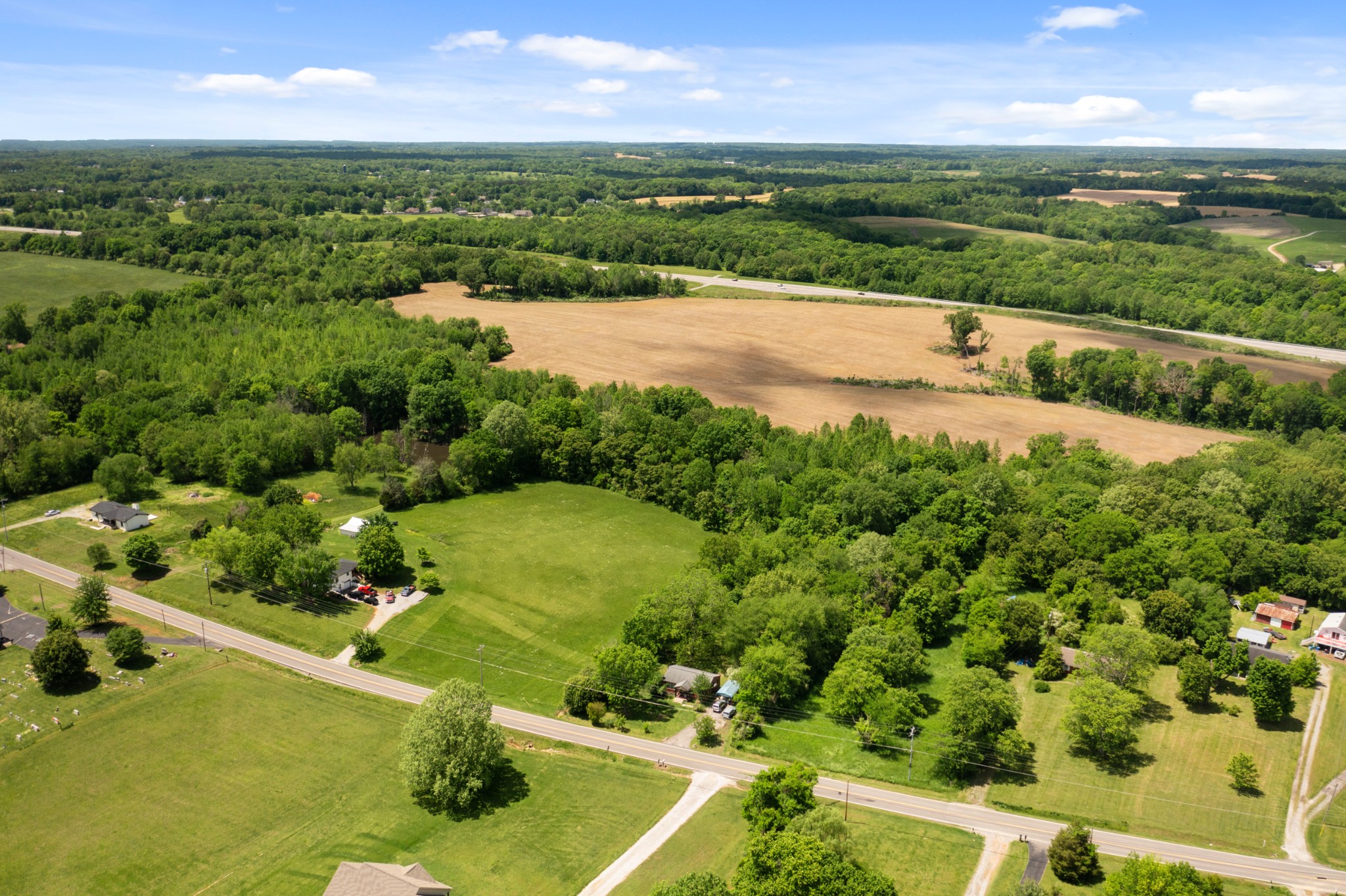 1 Tom Austin Highway Springfield, TN 37172 - Photo 3 of 15 an aerial view of a residential houses with outdoor space and trees all around