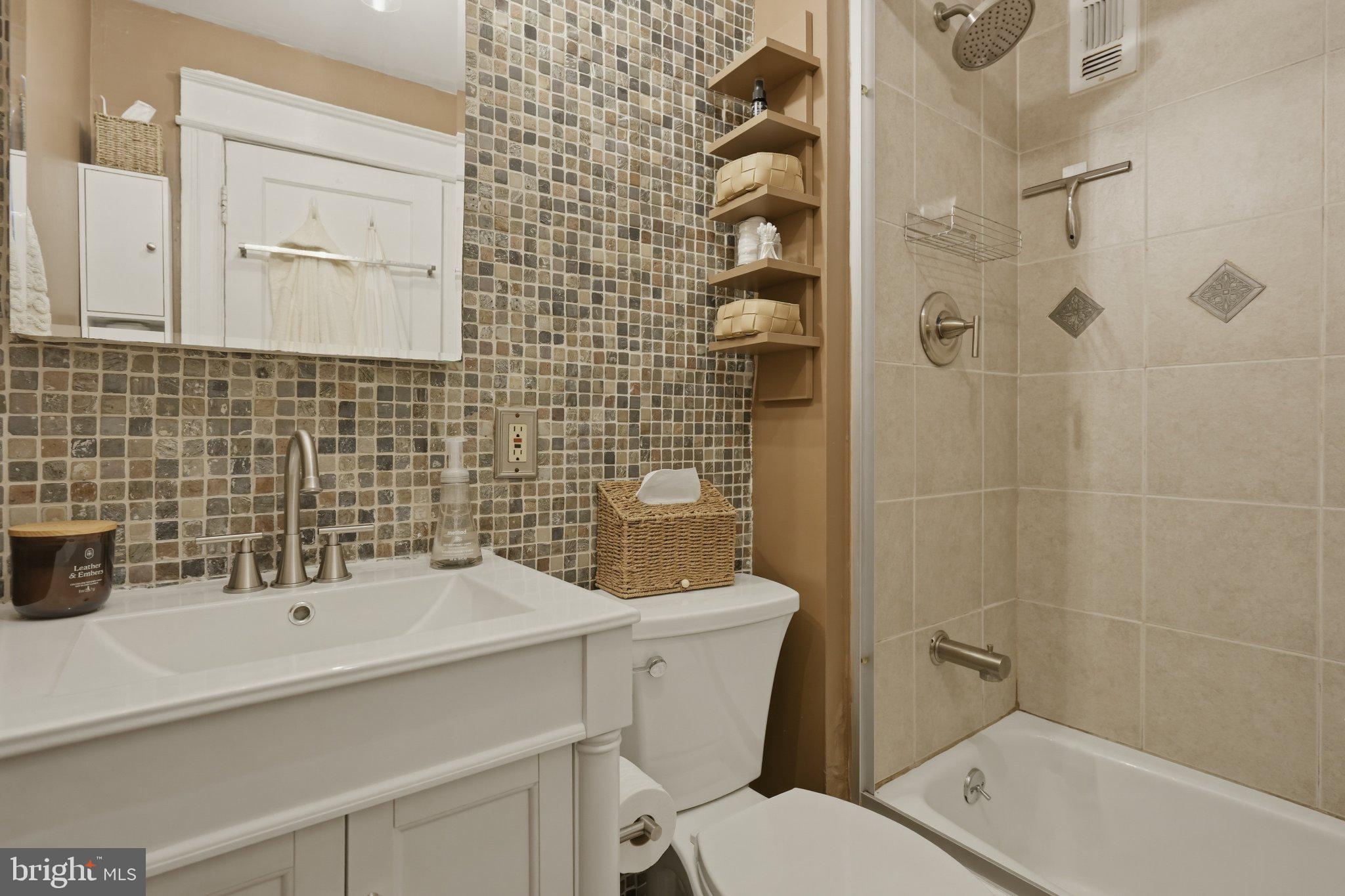 2010 Kalorama Road Northwest, Unit 304 Washington, DC 20009 - Photo 17 of 23 a bathroom with a sink a toilet and shower